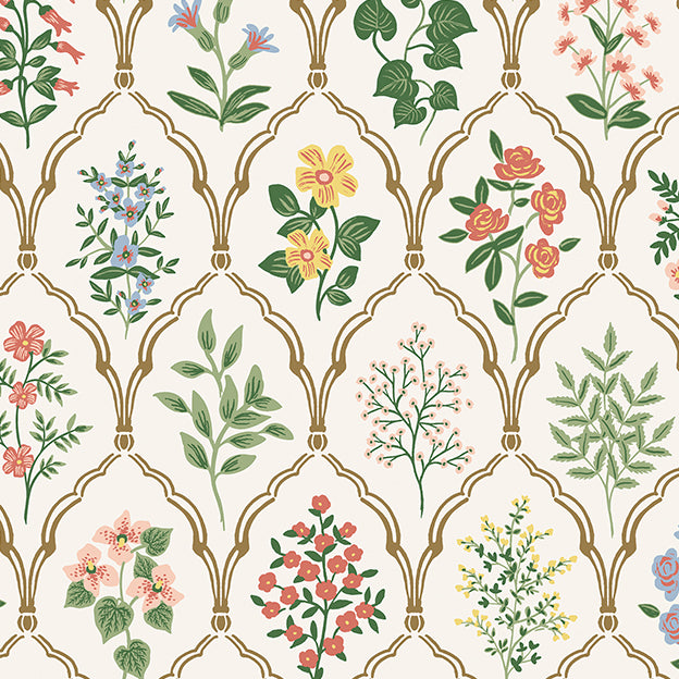 A floral patterned armchair with a peacock and foliage design on a white background.
